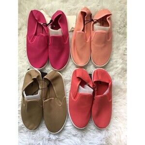 4 Pairs of Girls slip on sneakers. Size XL